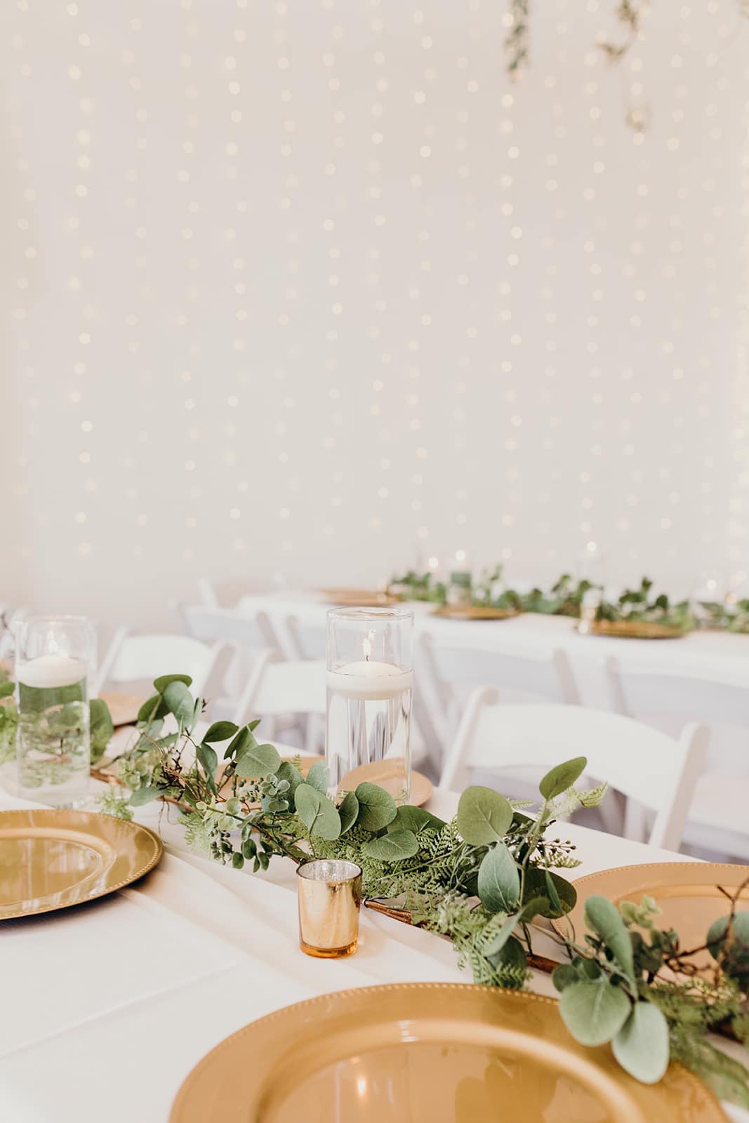 simple greenery and gold wedding reception decor