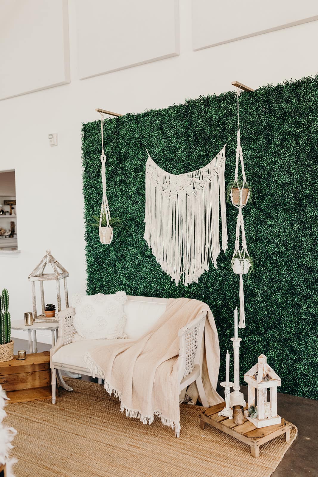 greenery wall with macrame photo backdrop