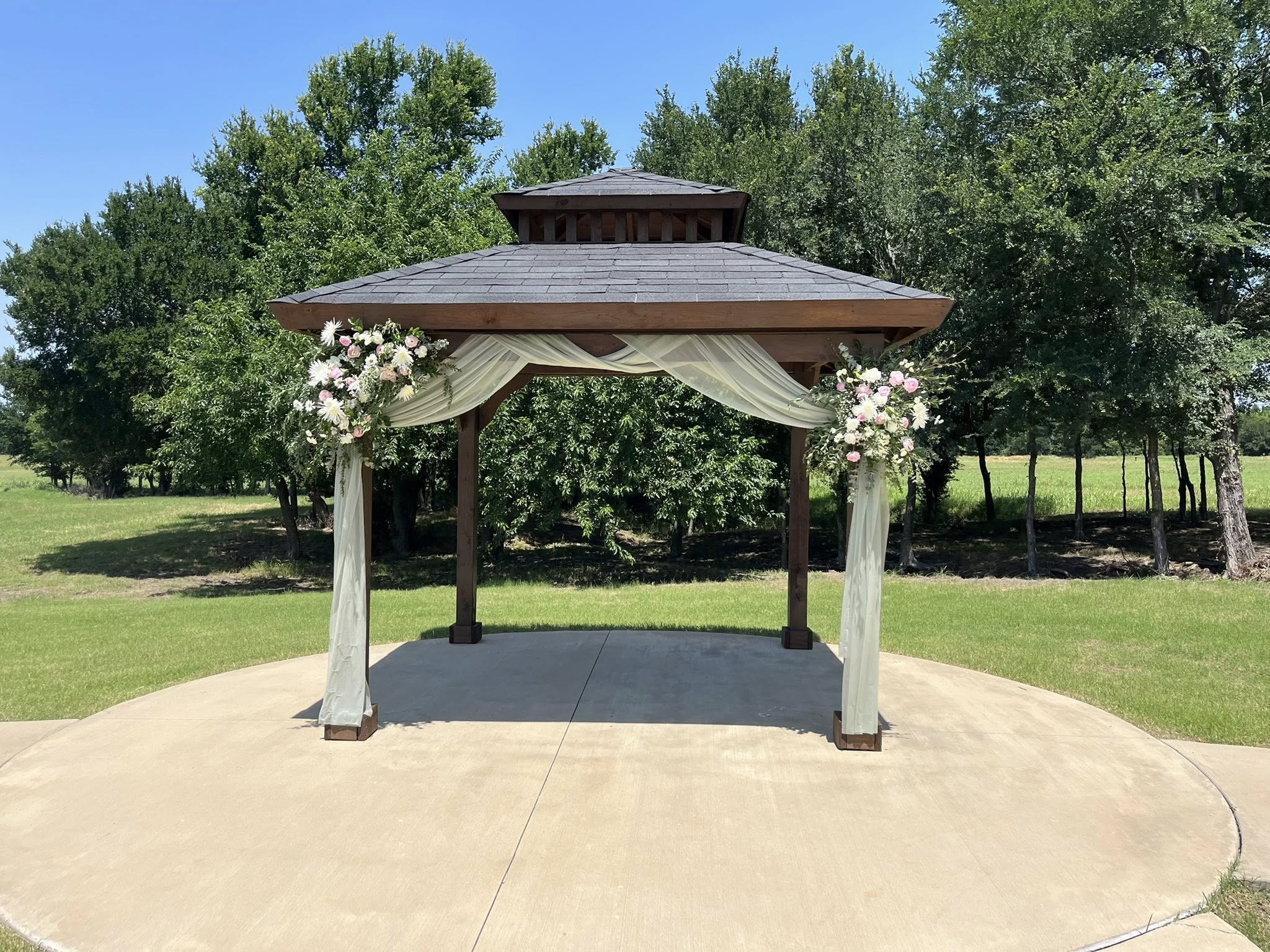 pavilion with drapery and flowers for wedding