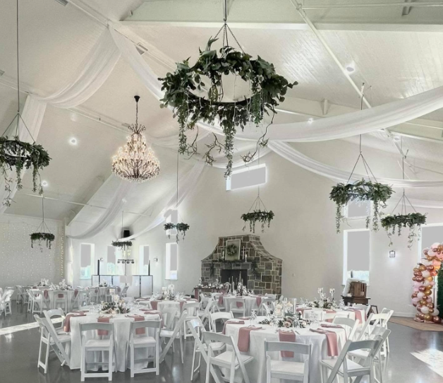 simple white and greenery decor for party